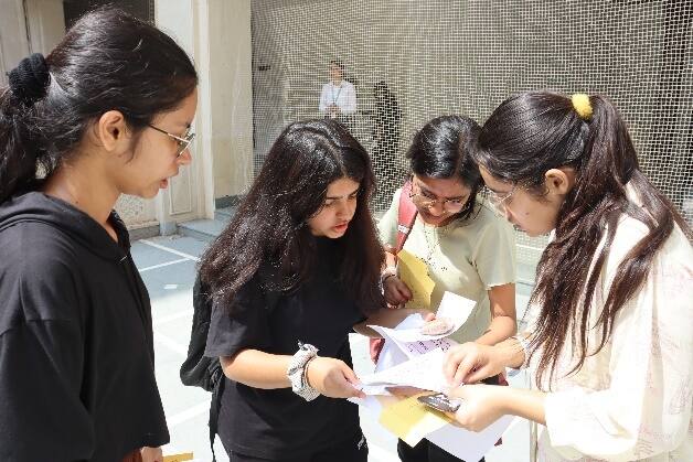 Participants deciphering Evidence Hunt clues