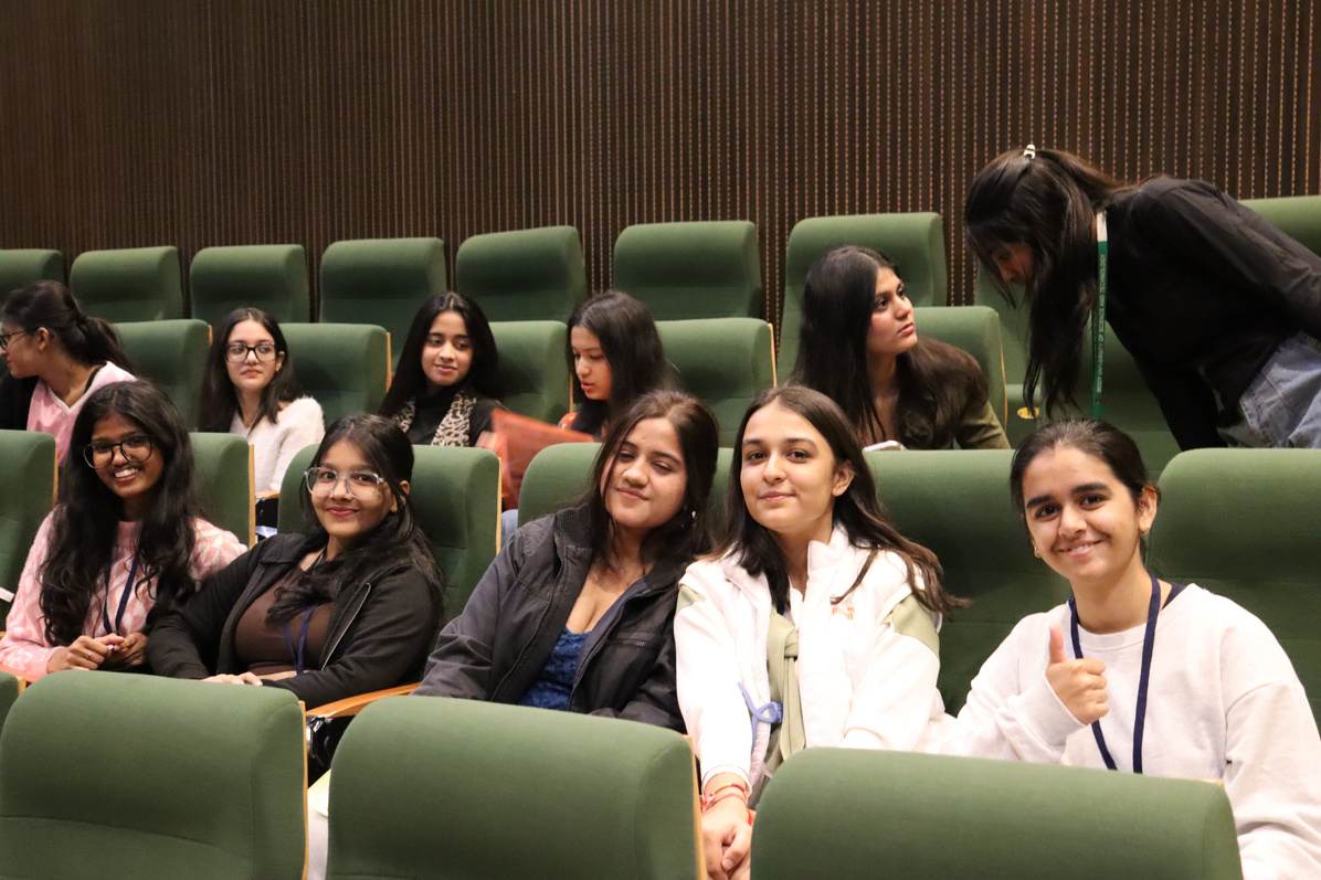 Participants attending the auditorium session